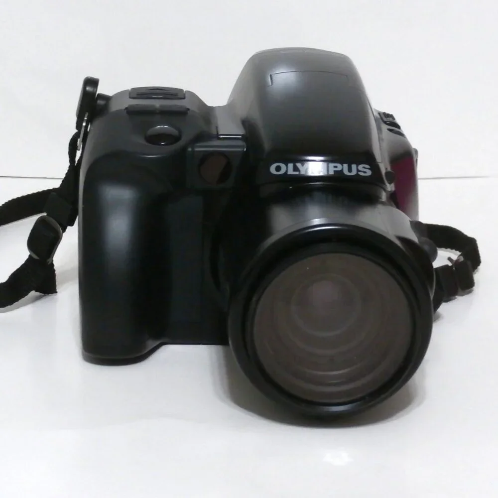 OLYMPUS IS-1, 35-135MM Camera F4.5-5.6 High Power Zoom, Dual-Strobe Flash